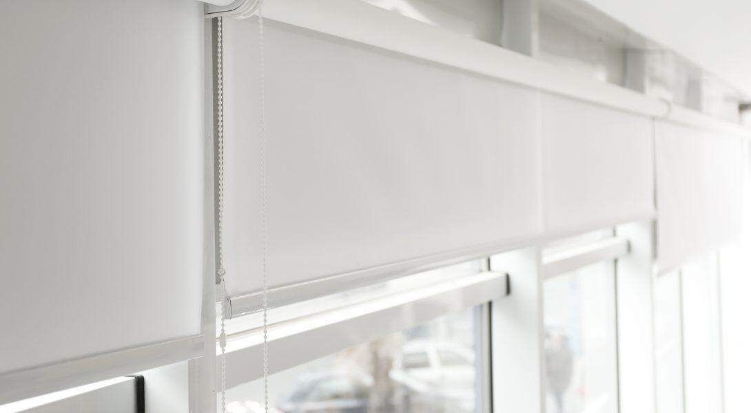 4. Modern Window with White Roller Blinds Indoors
