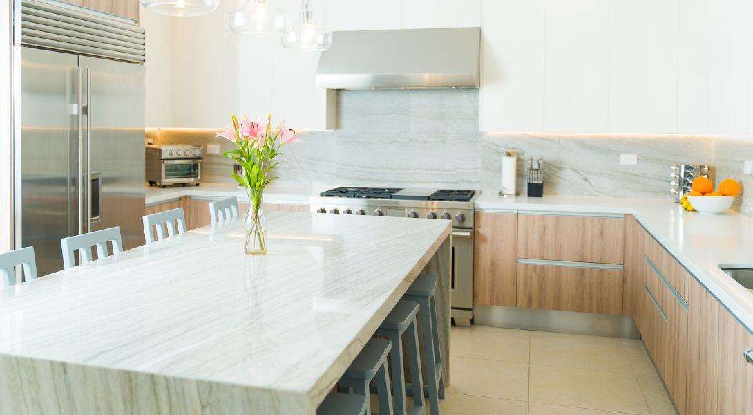 Luxury white kitchen with quartz countertops